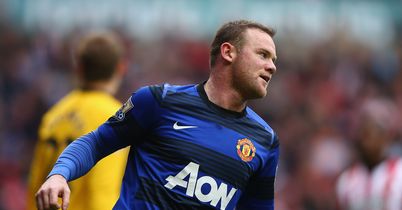 Rooney: Celebrates after scoring the winner